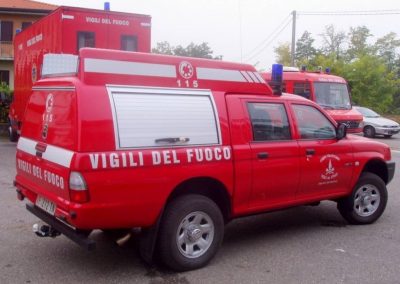 Pick up Nissan feu de fôret avec caisson et rideaux sur mesures